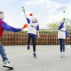 Children playing with cup and ball catchers