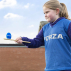 Young girl playing egg and spoon game