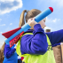 Young girl playing with 45cm red foam javelin