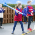 Young girl playing with 85cm blue foam javelin