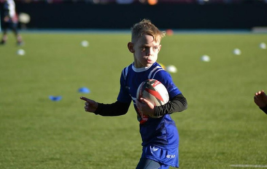 Taylor Plays Rugby