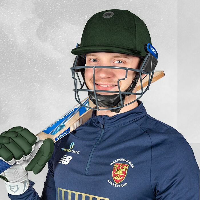 Batting helmet with a face guard